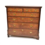 George III oak and mahogany cross-banded chest of drawers