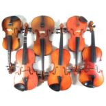 Six Chinese violins in cases