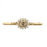 A diamond cluster brooch,