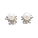 A pair of cultured pearl and diamond earrings,