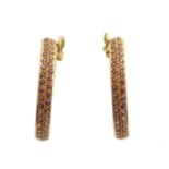 A pair of tourmaline hoop earrings,