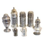 A selection of silver pepperettes,