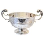 An Elizabeth II silver twin handled cup,