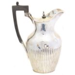A Victorian silver hot water jug,