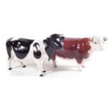 Beswick Hereford cow and a Friesian cow.