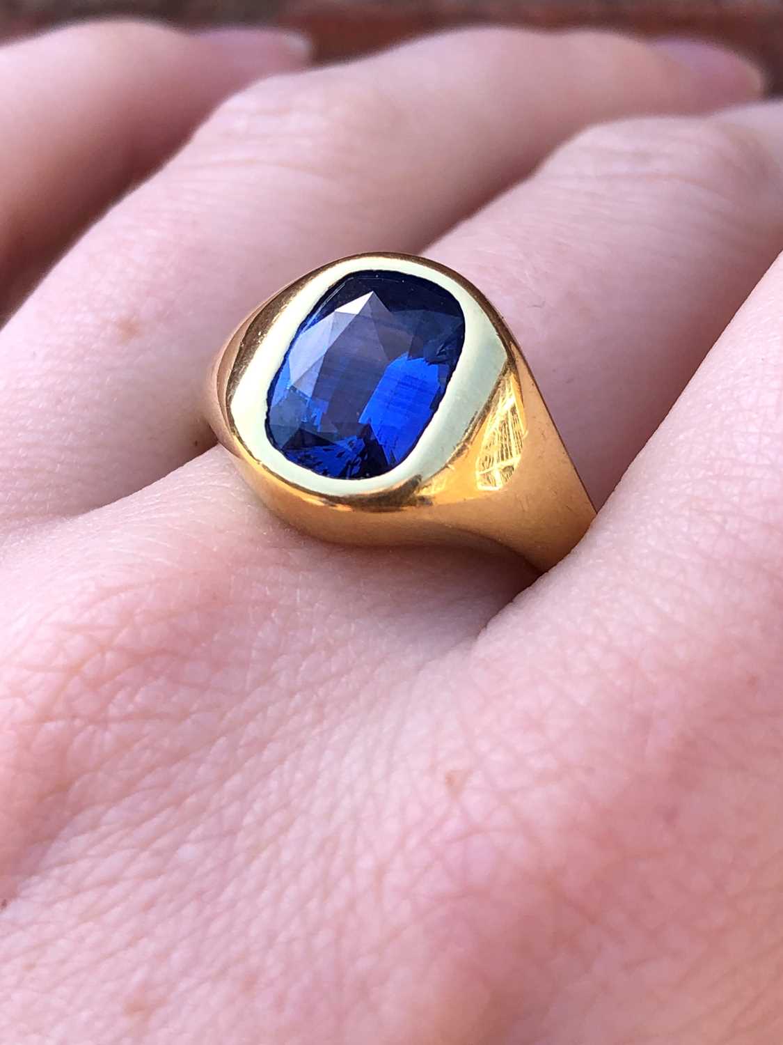 An 18ct gold sapphire single stone ring, - Image 6 of 7