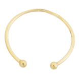 A 9ct gold torque bangle,