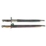 Two British / American bayonets and scabbards