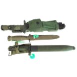 Three bayonets and scabbards