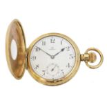 A gold plated Omega half hunter pocket watch,