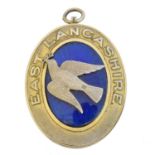 A silver gilt and enamel masonic locket,