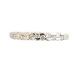 An 18ct gold diamond band ring,