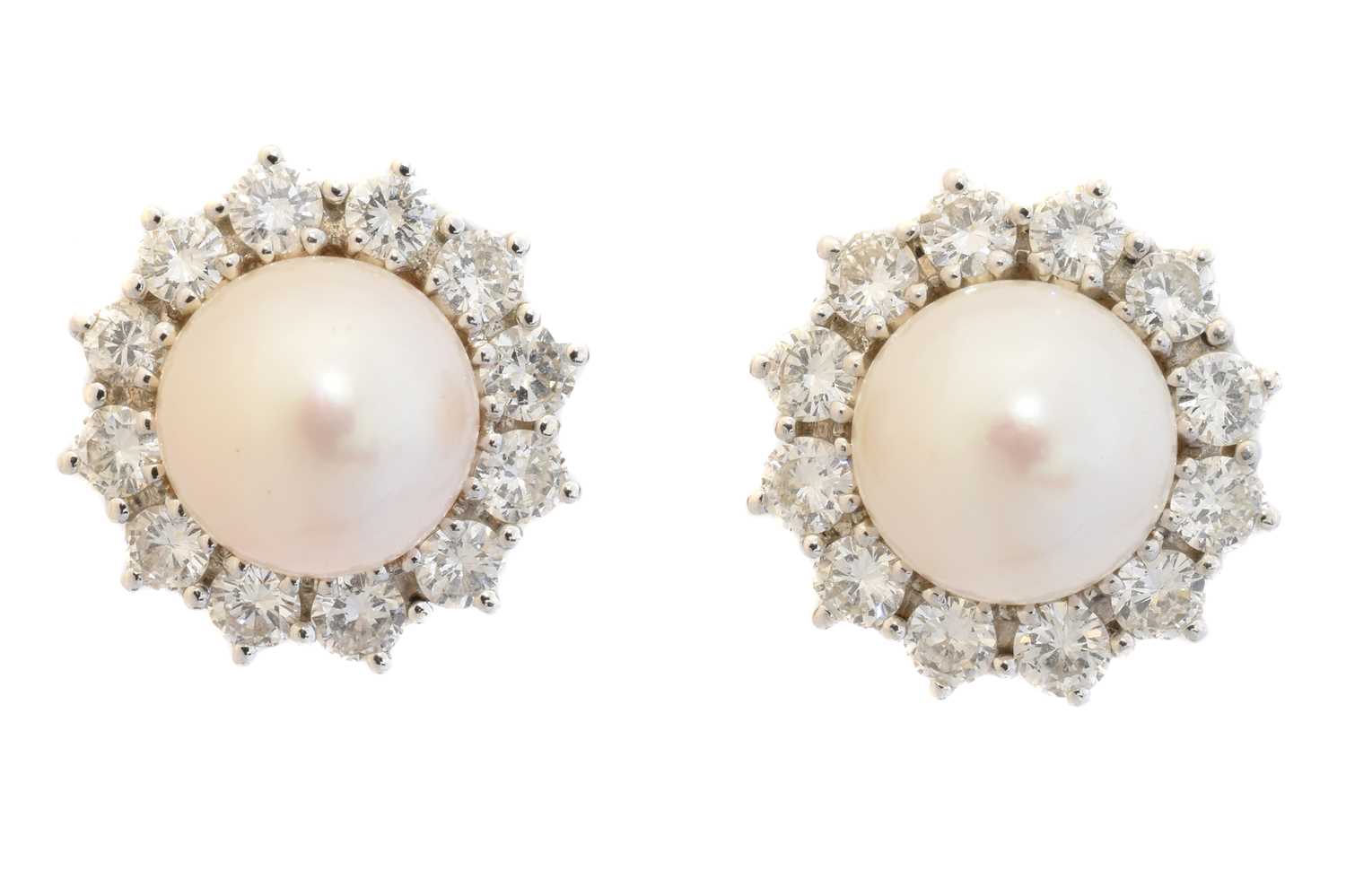 A pair of cultured pearl and diamond earrings,