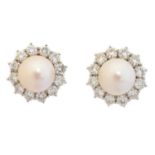 A pair of cultured pearl and diamond earrings,