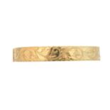 A 9ct gold hinged bangle,