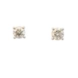 A pair of 18ct gold diamond stud earrings,