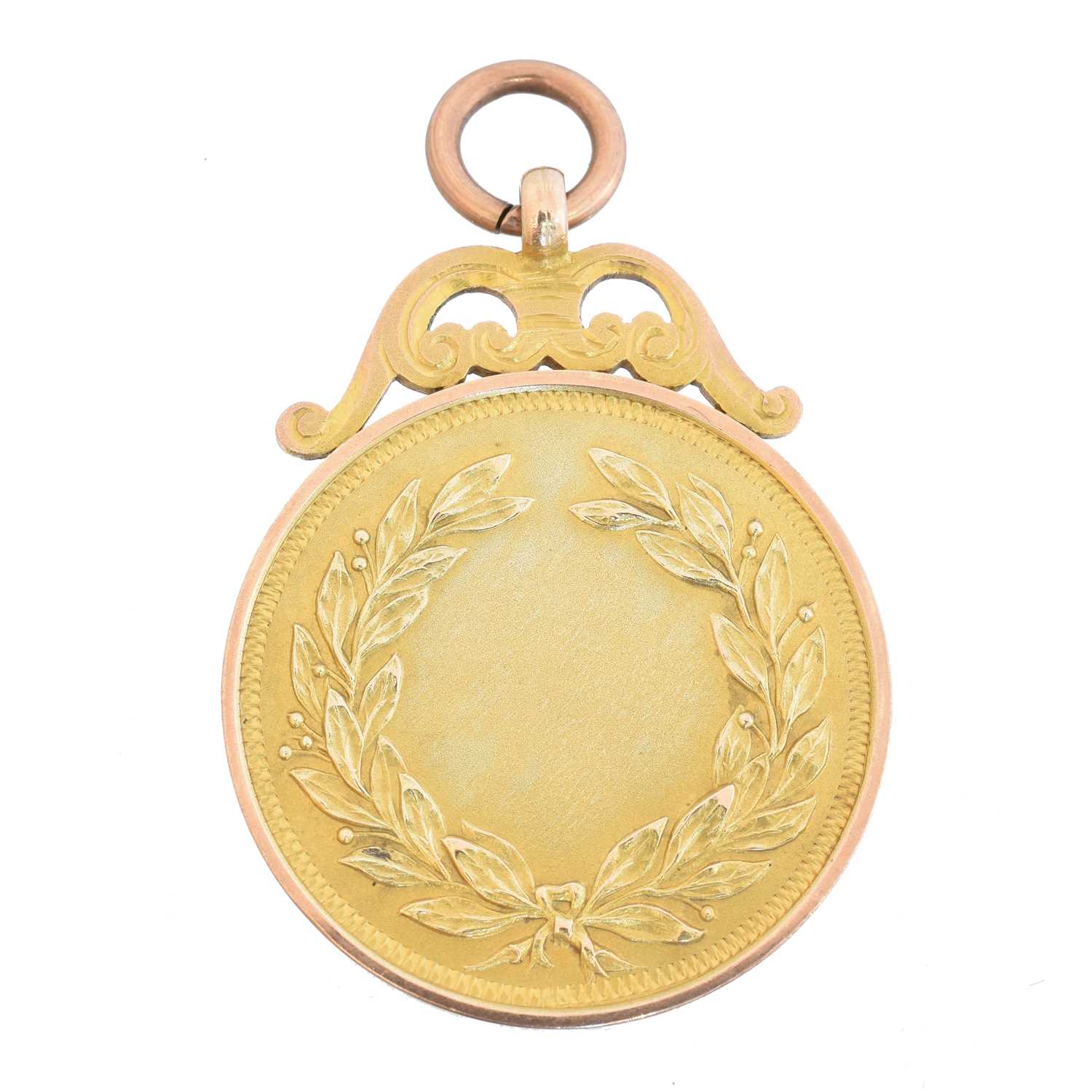 A 1920s 9ct gold medallion,