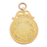 A 1920s 9ct gold medallion,