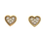 A pair of 18ct gold diamond heart stud earrings,