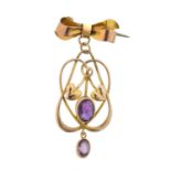 An early 20th century 9ct gold amethyst pendant by Murrle Bennett & Co.,