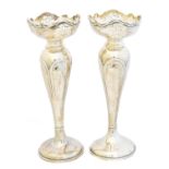 A pair of George V silver vases,