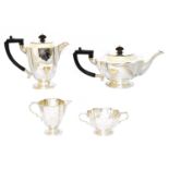 An Art Deco four piece silver tea set,