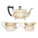 A silver three piece teaset,