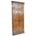 George III oak double floor standing corner cupboard