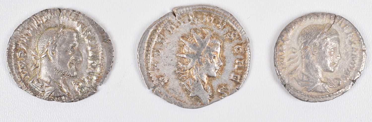 Three Roman coins (3).