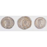 Three Roman coins (3).