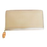 A Gucci Bamboo Pearl Zip Around Wallet,