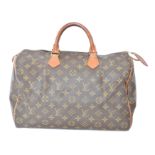 A Louis Vuitton monogram Speedy 35 handbag,