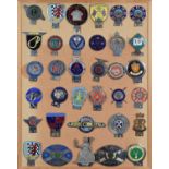 Collection of 34 car badges