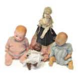 Four dolls to include an articluated bisque doll by Armand Marseille, two other articulated