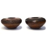 Two earthenware vases by Buzephi Magwaza