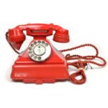 Model 232 red bakelite telephone