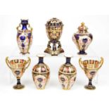 7 pieces of miniature Royal Crown Derby Selection of Vases