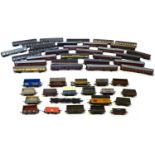 Group lot of 50 OO gauge rolling stock, coaches and wagons by makes such as Lledo, Hornby, Dapol,