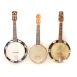 Three ukulele banjos