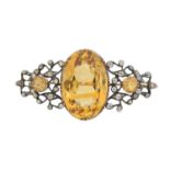 A citrine and diamond brooch,