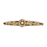 An early 20th century split pearl hinged bangle,