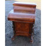 A Victorian burr walnut piano top davenport desk, with pop up mechanism, the interior fitted with