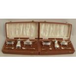 Two hallmarked silver cased condiment sets