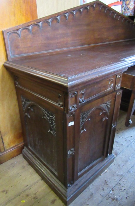 A late 19th century oak sideboard, with carved triangular back, fitted with a central drawer flanked - Image 2 of 4