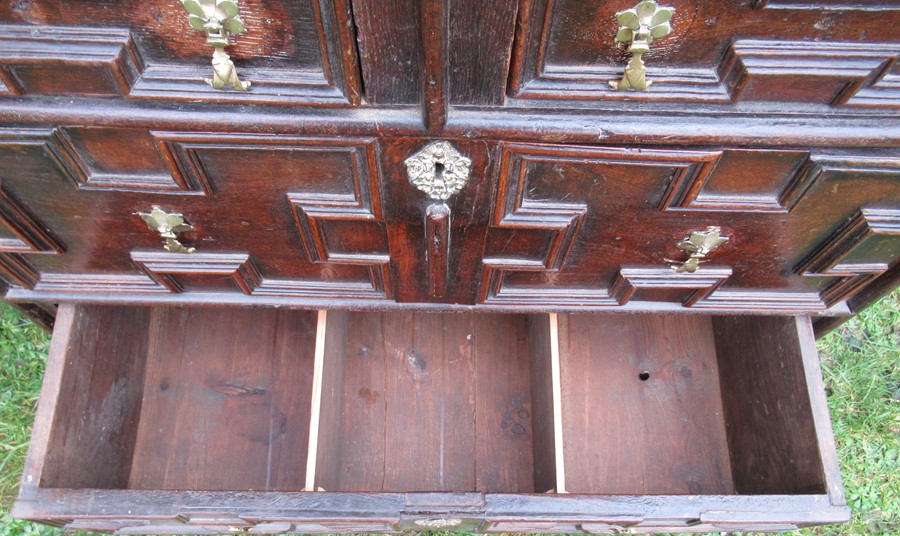 A 17th century style moulded front chest, of two short drawers over three long drawers, width - Image 2 of 6