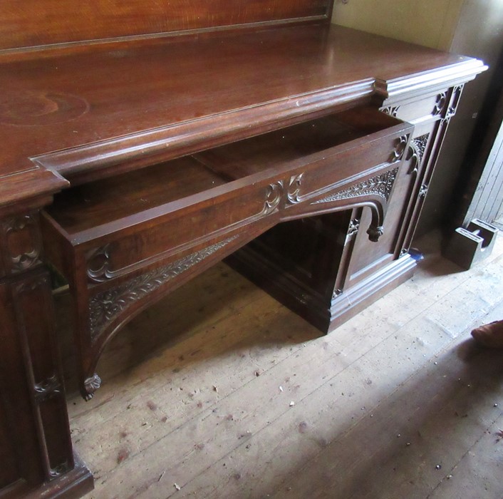 A late 19th century oak sideboard, with carved triangular back, fitted with a central drawer flanked - Image 3 of 4