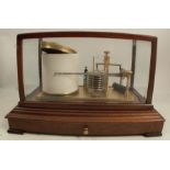 A G Luck Co Ltd mahogany and glass cased barograph, fitted with a drawer to the base, 14ins x 9ins