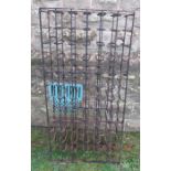A 72 bottle metal wine rack, probably late 19th century, height 48ins x depth 10ins x width 24ins