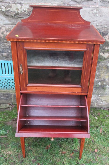 An Edwardian mahogany music cabinet, with part glazed door and pull out canterbury below, width - Image 2 of 2