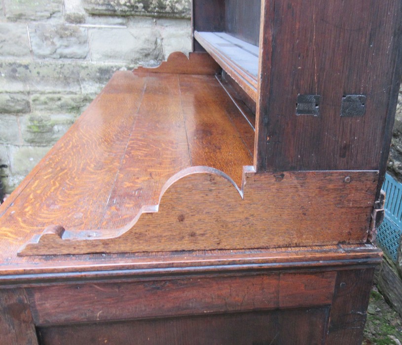 A Georgian cupboard dresser, with an associated close boarded Delft rack over three frieze - Image 4 of 7